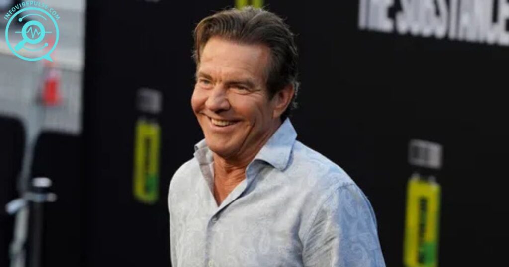 Dennis Quaid smiling on the red carpet, wearing a light patterned shirt at a public event.
