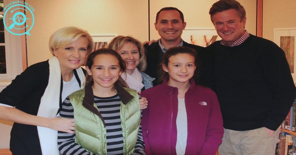 Joe Scarborough with Mika Brzezinski and family, smiling together during a casual gathering