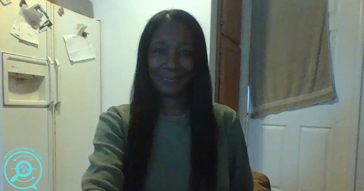 Kelly South smiling indoors, known as Kid Rock’s baby mama.