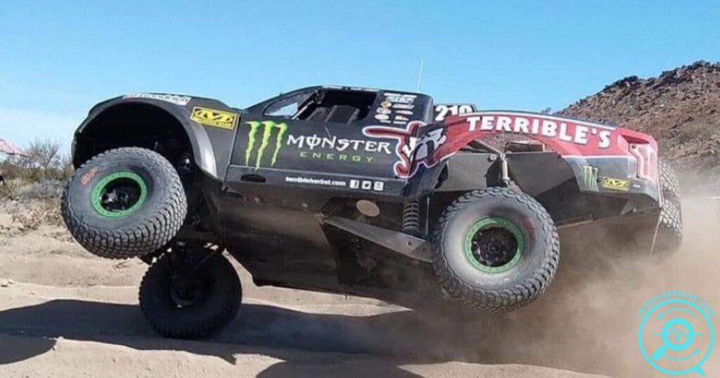 Thor Herbst’s off-road race truck in action during a desert competition, showcasing his motorsport career.