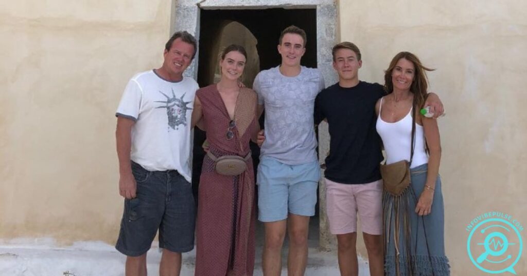 Thor Herbst standing with his parents and siblings, showcasing the close-knit Herbst family.